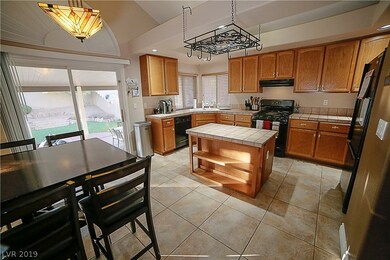 Eat-in Kitchen has large tile floors, garden windo