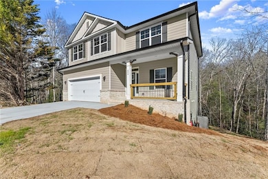 Craftsman-style house with covered porch, concrete