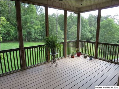 SIT ON THIS SCREENED PORCH AND ENJOY LIFE AT ITS' 