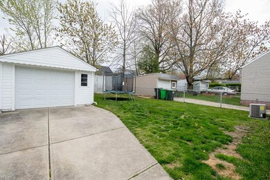 garage with fenced rear yard