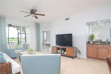 Tiled living room with ceiling fan