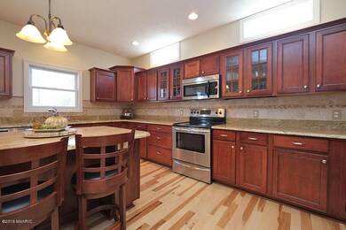 10877 Country Grove Cir, Portage, MI 49024 - photo 4