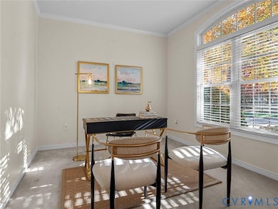 Bright front room with large arched window—perfect for a home office, sitting room, or study.
