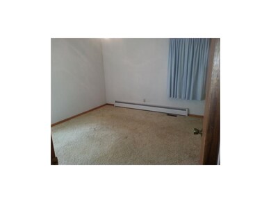 Master bedroom with half bath to the right.
