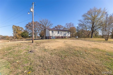 View of front of house featuring a front lawn