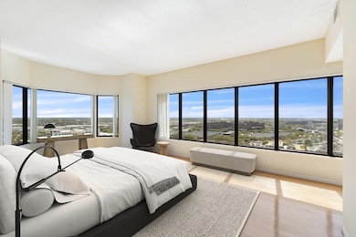 Spacious primary suite with amazing SE views. Imag