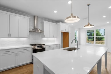 quartz countertops, tile backsplash