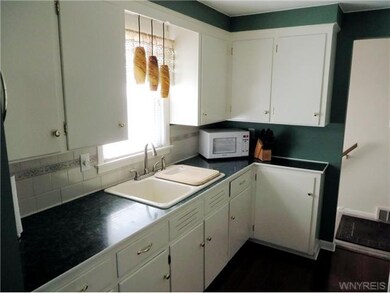 Kitchen. Updated counter top, sink, faucet. Cherry