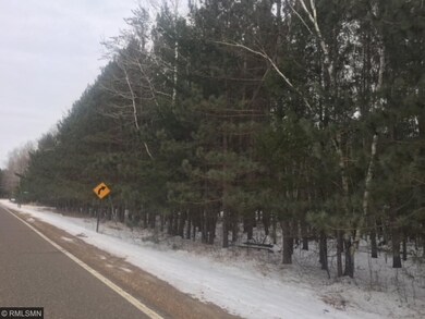 Road leading up to lot, view of mature trees
