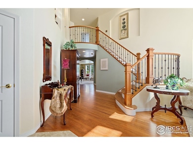Open the door and be wowed by the soaring ceilings, beautiful wood floors, and the outstanding staircase that has been recently completed