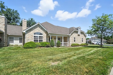 end unit attached condo on one side