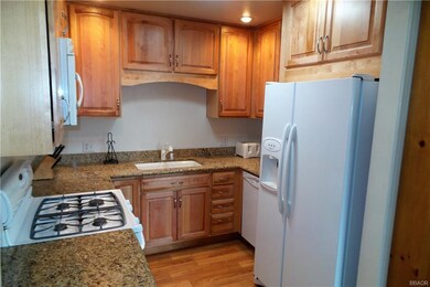 Wonderful Granite and Hickory Cabinets