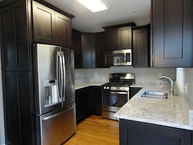 Kitchen. Brand new espresso cabinets , solid surfa