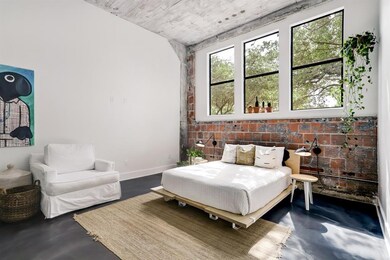 Very large bedroom with large windows and 12' ceil