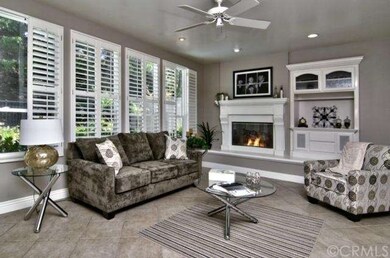 Fashionably charming family room features diagonal