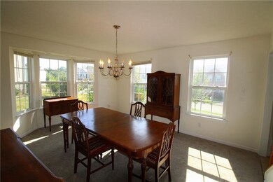 Dining room has bay window.