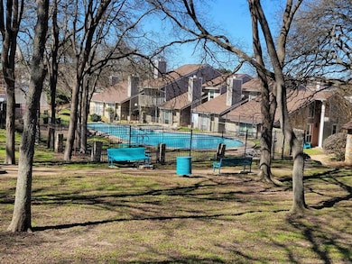 Pool featuring fence, a yard, and a residential v
