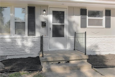 Property entrance with covered porch