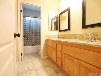 Dual sink vanity with beautiful granite counter to