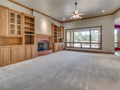 Living room with oak built-ins, gas fireplace can 