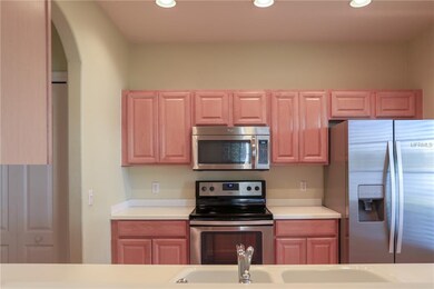 View into the kitchen from the pass-through, conve