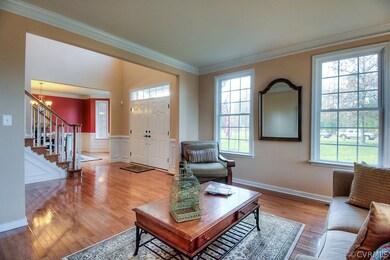 Formal Living room open to Foyer with stunning lig
