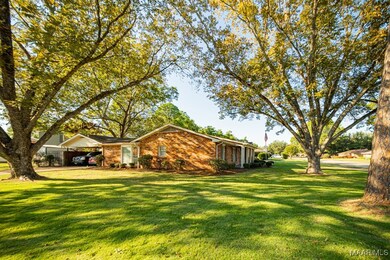 Mature trees make this a lovely yard to enjoy.