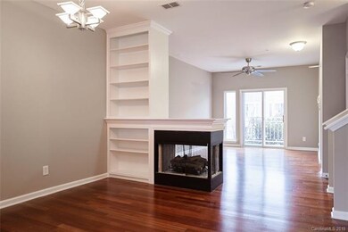 Open Floor plan with dual sided fireplace and buil