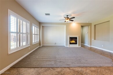 Unfurnished living room with a glass covered firep