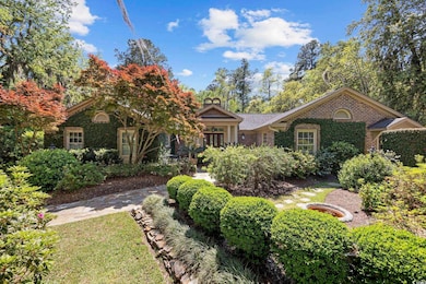 View of front of house featuring brick siding