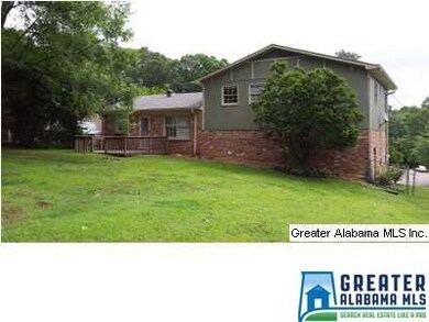 Back view of home and yard.
