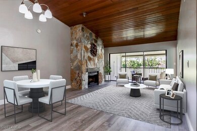 Living room featuring wood ceiling, a notable chan