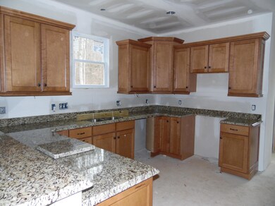 Maple cabinets with granite countertops
