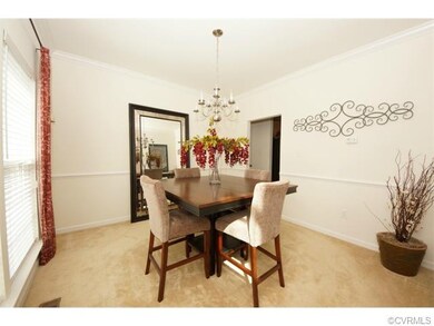 Formal Dinning Room with chair rails & crown moldi