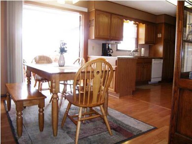 The dining has appealing easy-care flooring and is