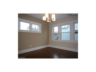 Dining Room- new light fixture- refinished Hardwoo