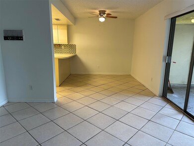 Breakfast room off the kitchen and adjacent to the family room with view of yard/water