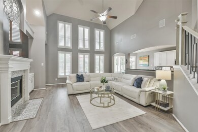 Home has plenty of natural ligh and comes with custom shutters.