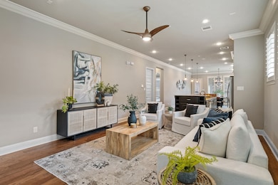 This chic living area offers seamless flow into th
