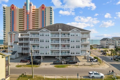 View of building exterior featuring uncovered park