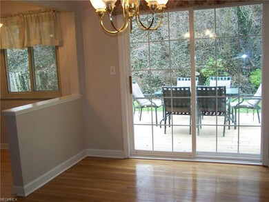Formal dining room with sliding doors onto composi