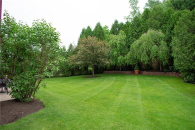 professionally maintained level rear yard with pri