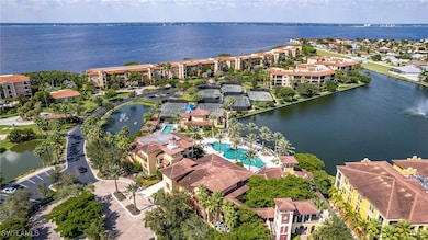 Bird's eye view with a water view and a residentia