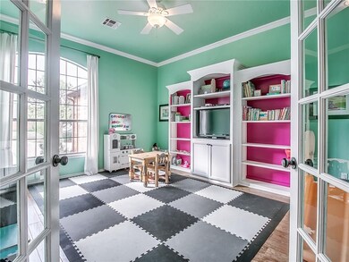 Study currently being used as a play area! Large enough to make a great space for just about anything.. Craft Room, Media Room, Art Room, Studio, or turn it back in to an office!