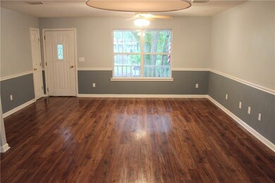 The two tone paint and chair rail up the style of