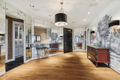 Zuber wallcoverings, antiqued mirrors and designer