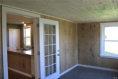 Front Porch leading into Kitchen