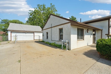 Oversized two car garage offers lots of storage space.