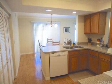 View of dining area. Large pantry behind doors on 