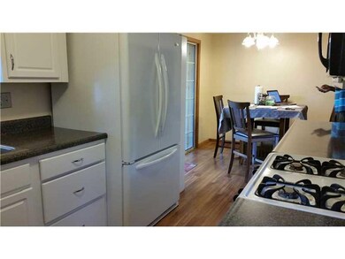 Eat in Kitchen with updated lighting! Laminent flo